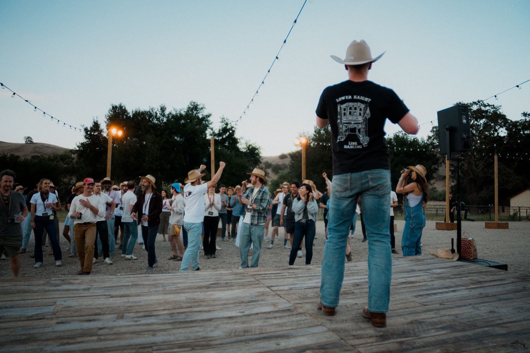 Sean Sullivan leading a line dance at Cognition’s 2026 Ranch offsite