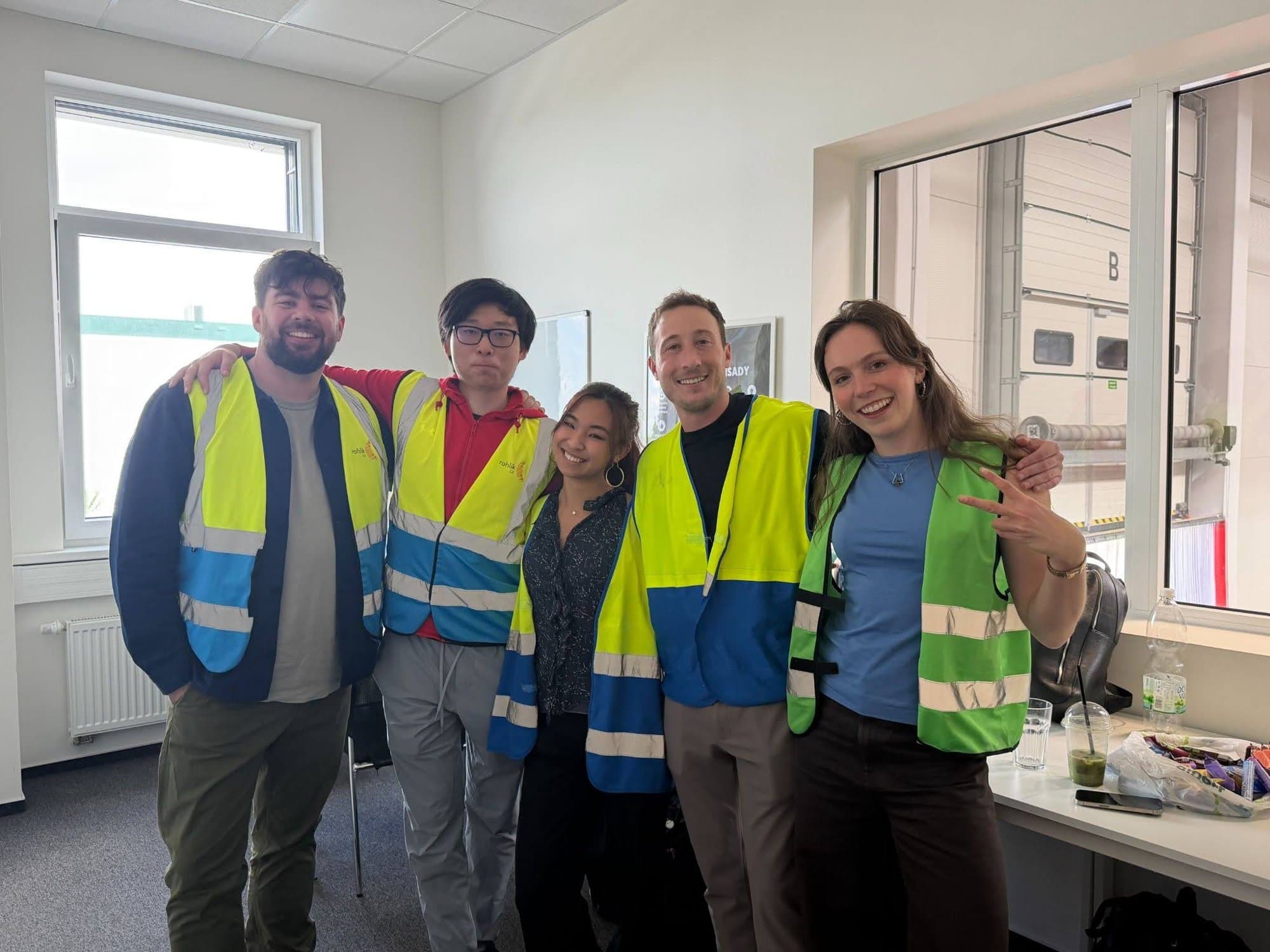 Ryan and the Rohlik account team in hi-vis vests at the Prague warehouse