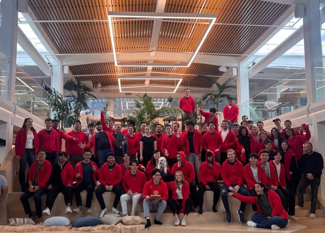 The Cognition SF team wearing matching red hoodies for Ryan’s birthday